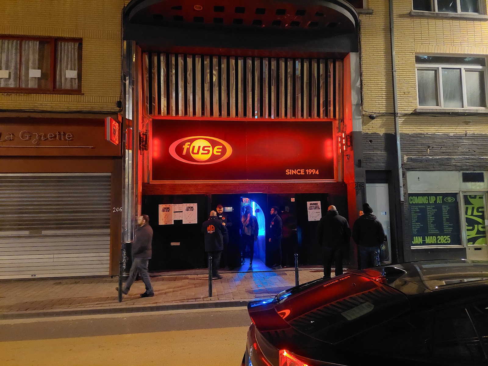 Fuse Brussels techno club dark dance floor with stage lighting