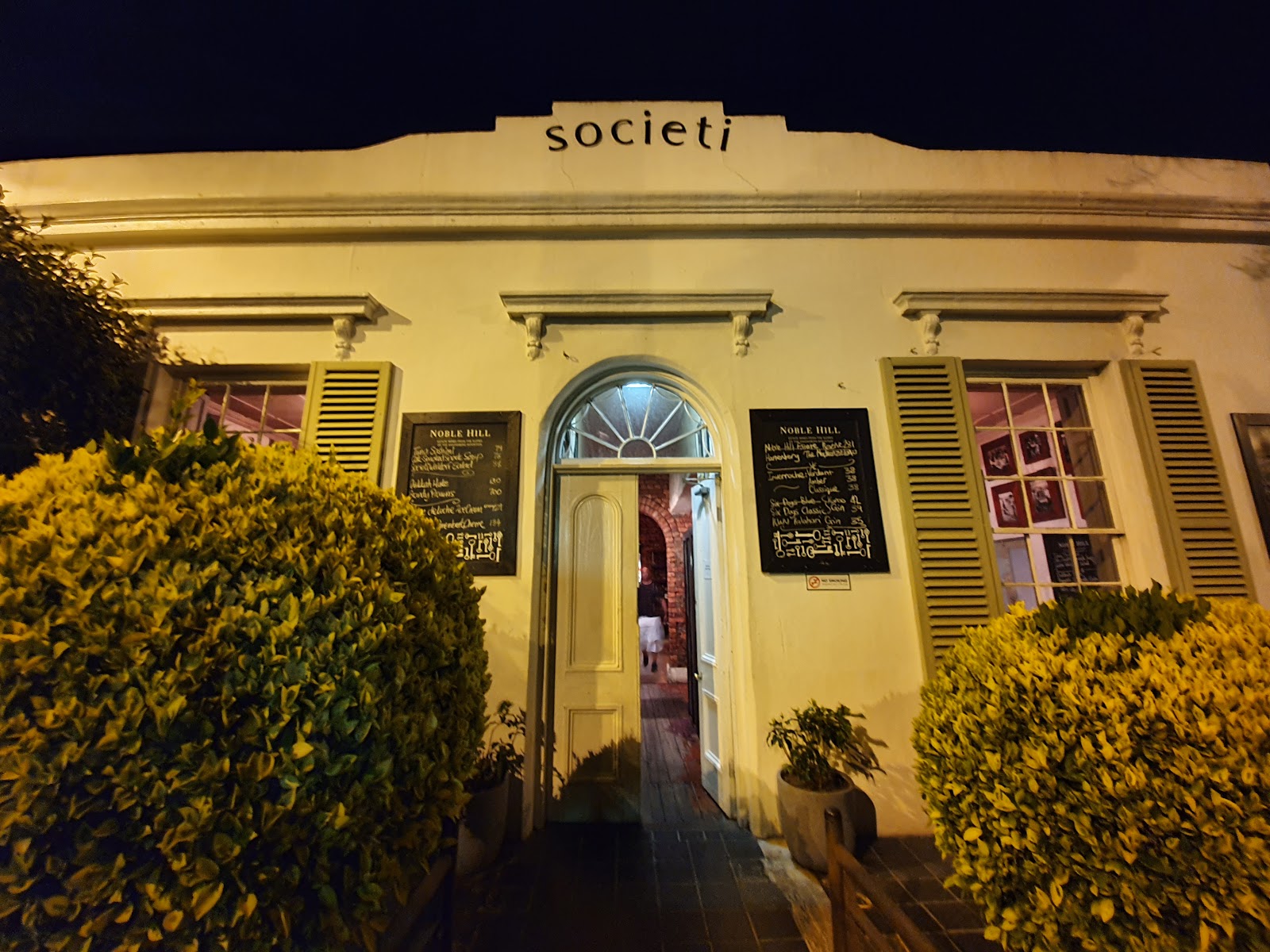 Leather-lined bar and bottle shelf at Societi Bistro in Gardens Cape Town
