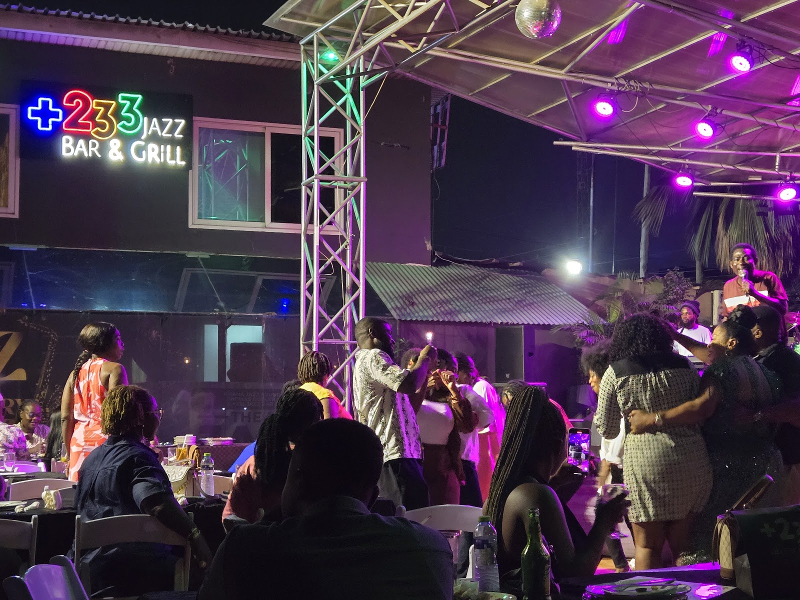 Live jazz stage bathed in warm light, close to the nightly mood at +233 Jazz Bar and Grill Accra