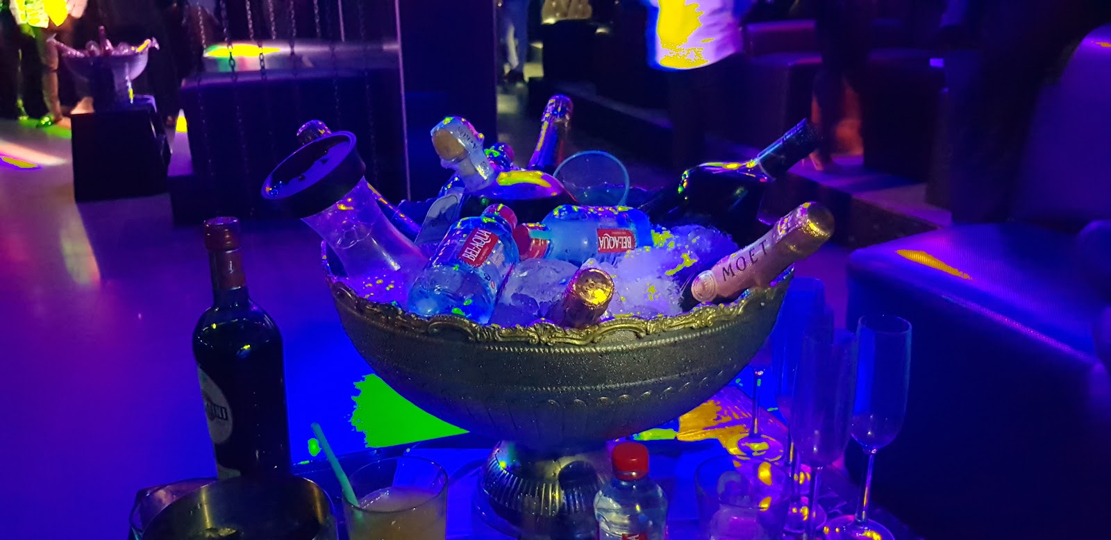 Sleek lounge bar with crafted cocktails under low light, matching the renovated upstairs at Twist Lounge and Bar Accra