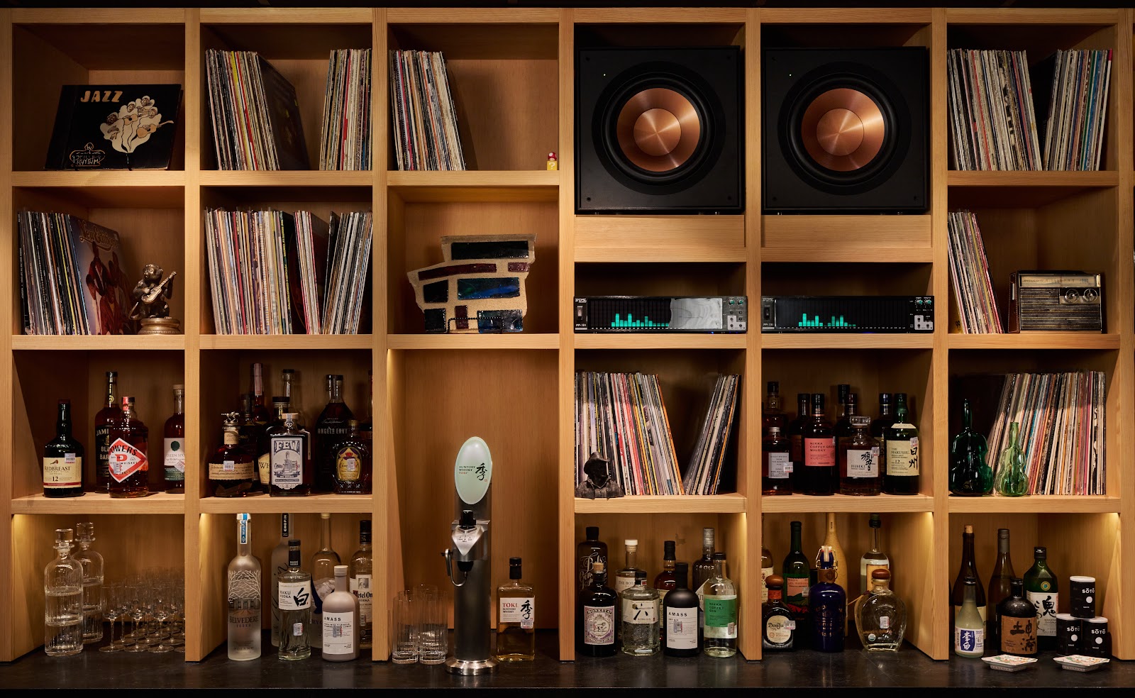 Low lit speakeasy style bar, similar in feel to Equipment Room Austin