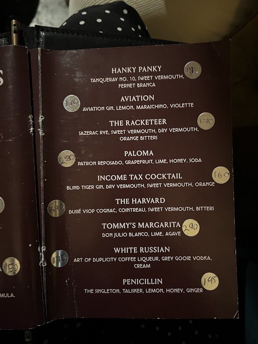 Art of Duplicity cocktail at the bar