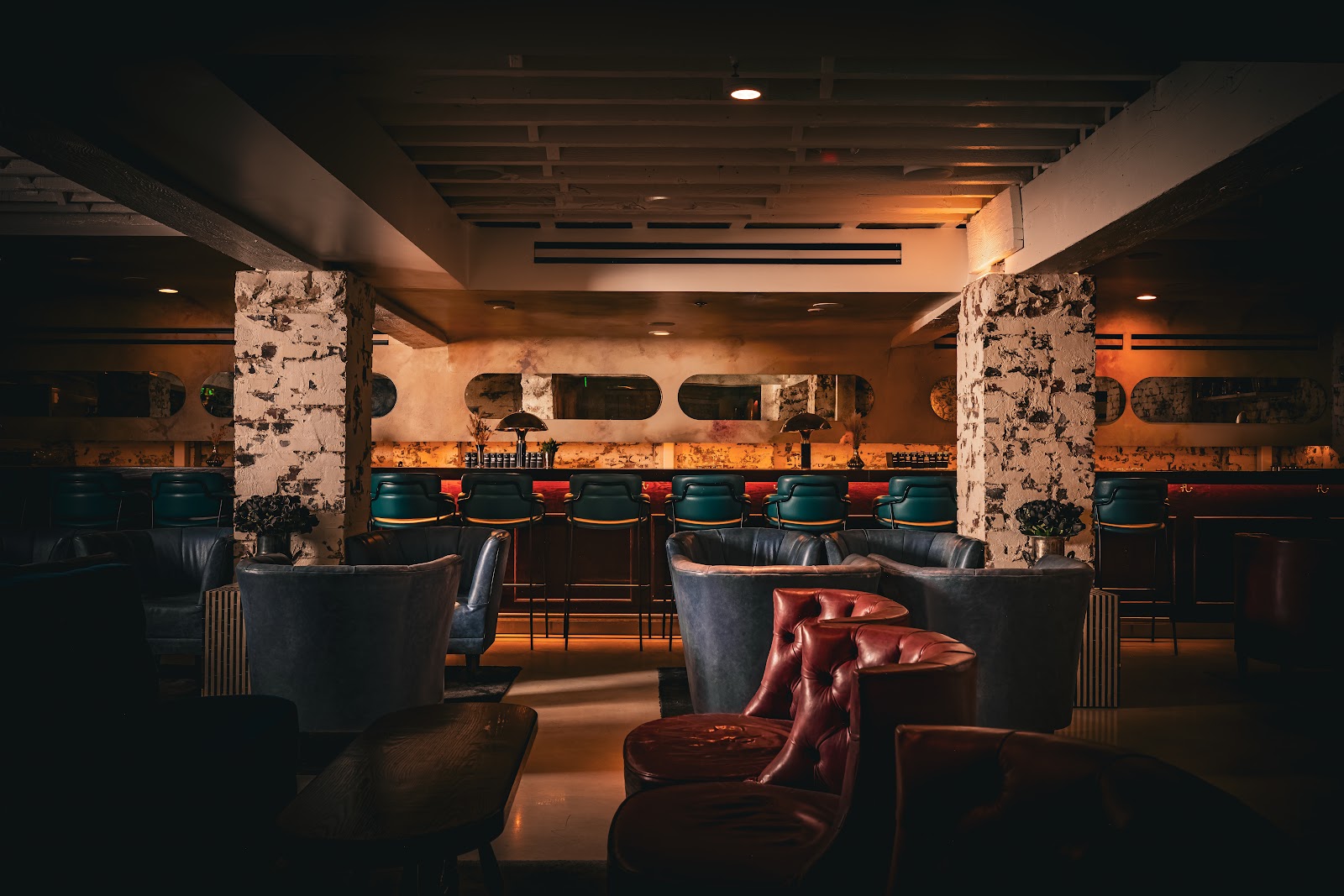 Dim underground cocktail lounge, similar in mood to Run for the Roses in Denver