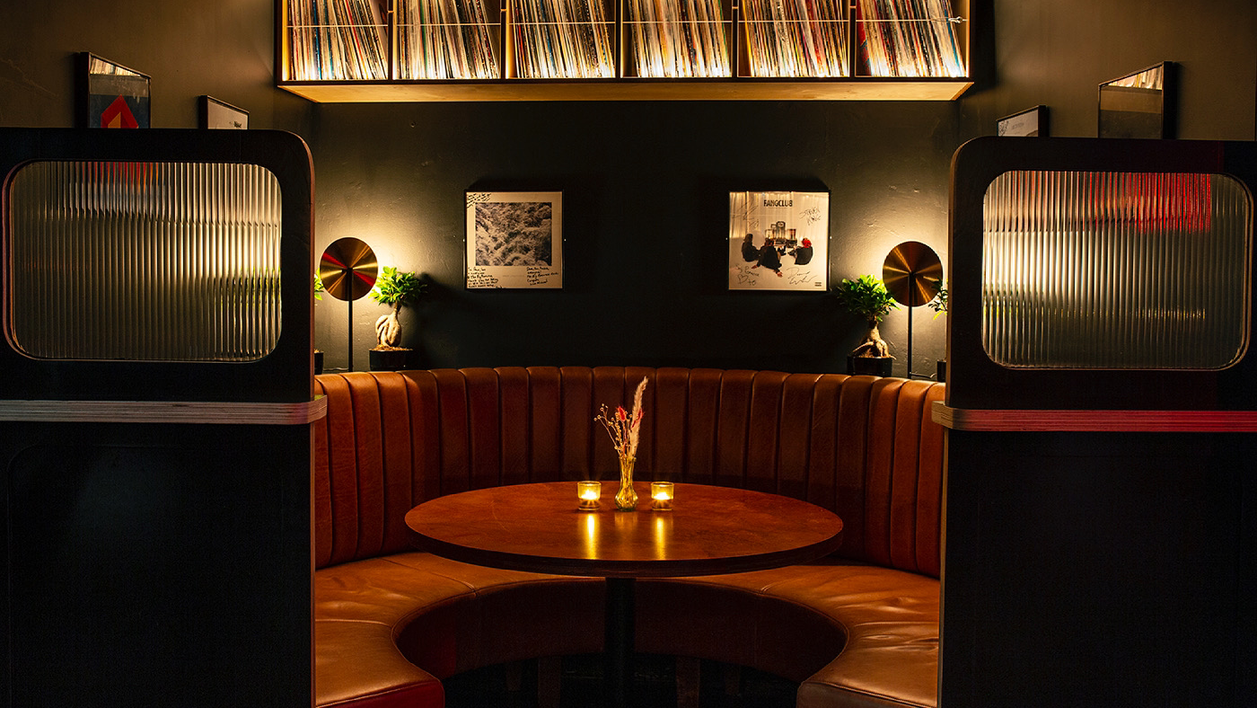 Low lit music bar with warm tones, similar in feel to The Big Romance Dublin