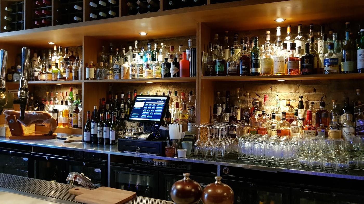 Candlelit cellar wine bar interior with stone walls, Charlotte Square Edinburgh