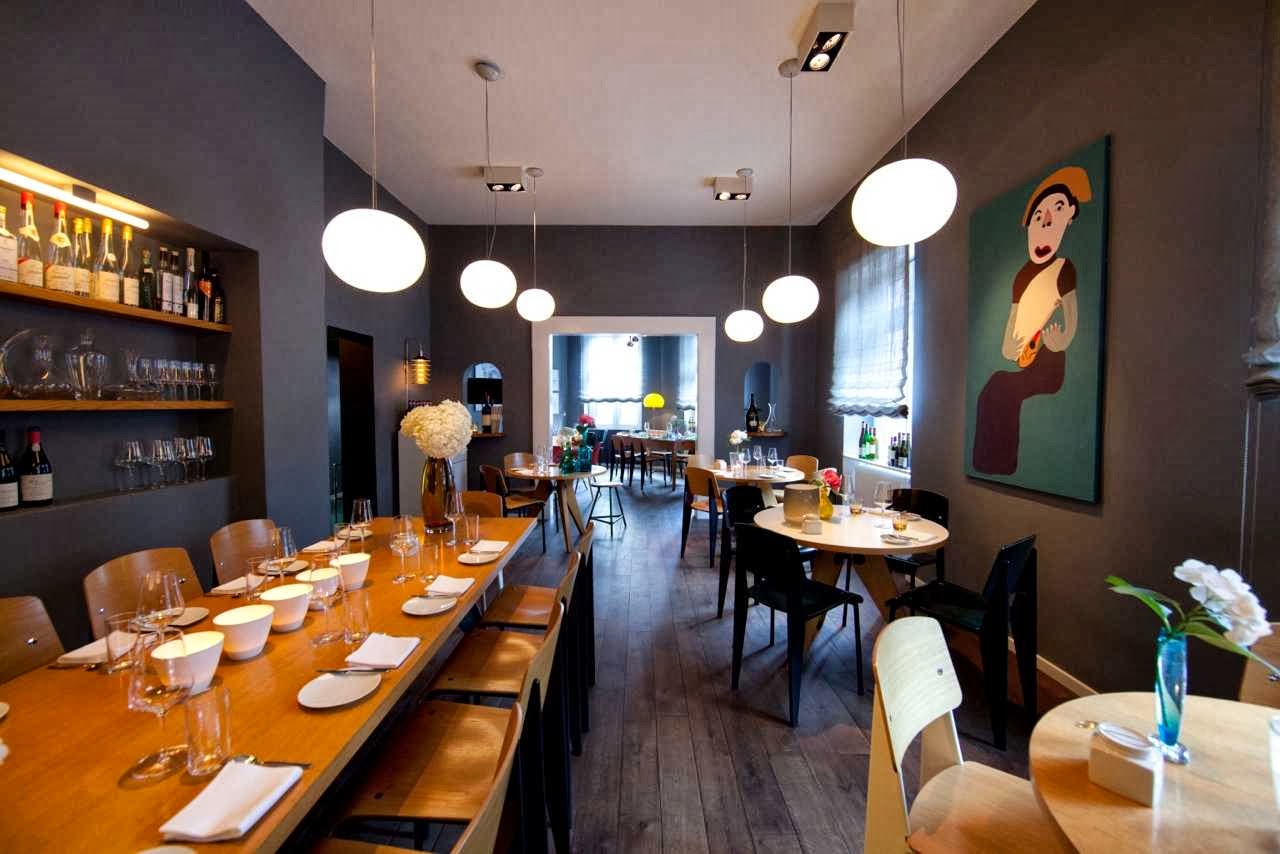 Weinsinn Frankfurt wine restaurant interior, dark dining room