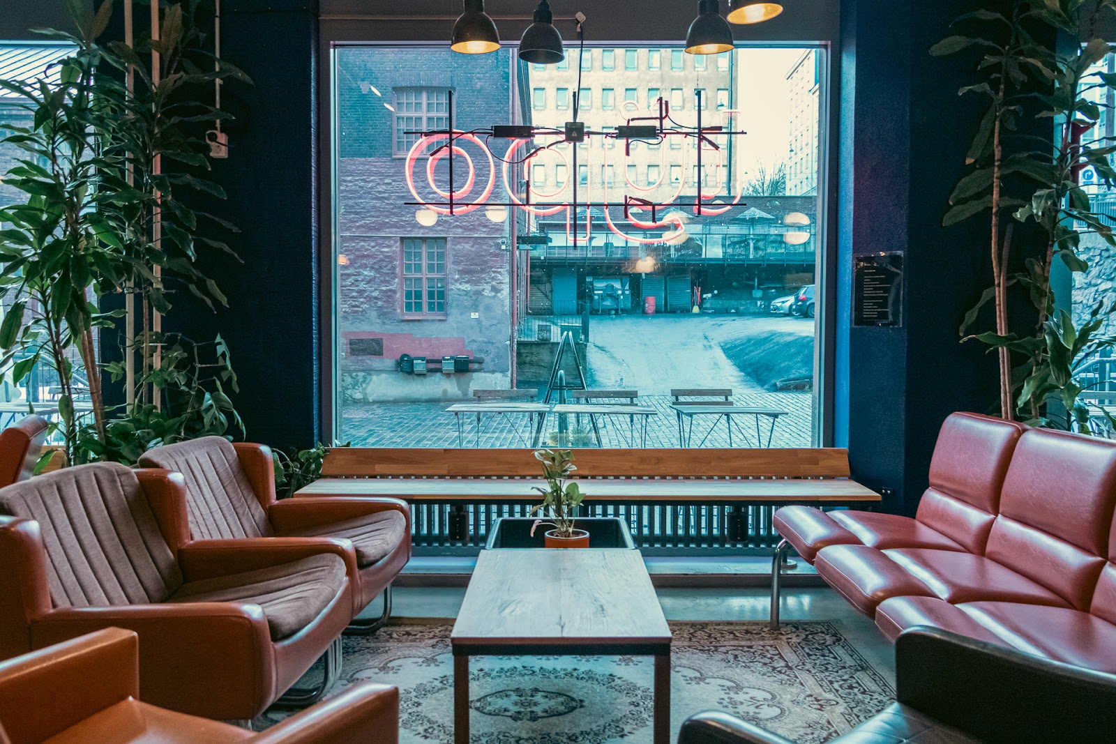Colourful bar interior with stools and warm light, similar in feel to Bar Typo Helsinki