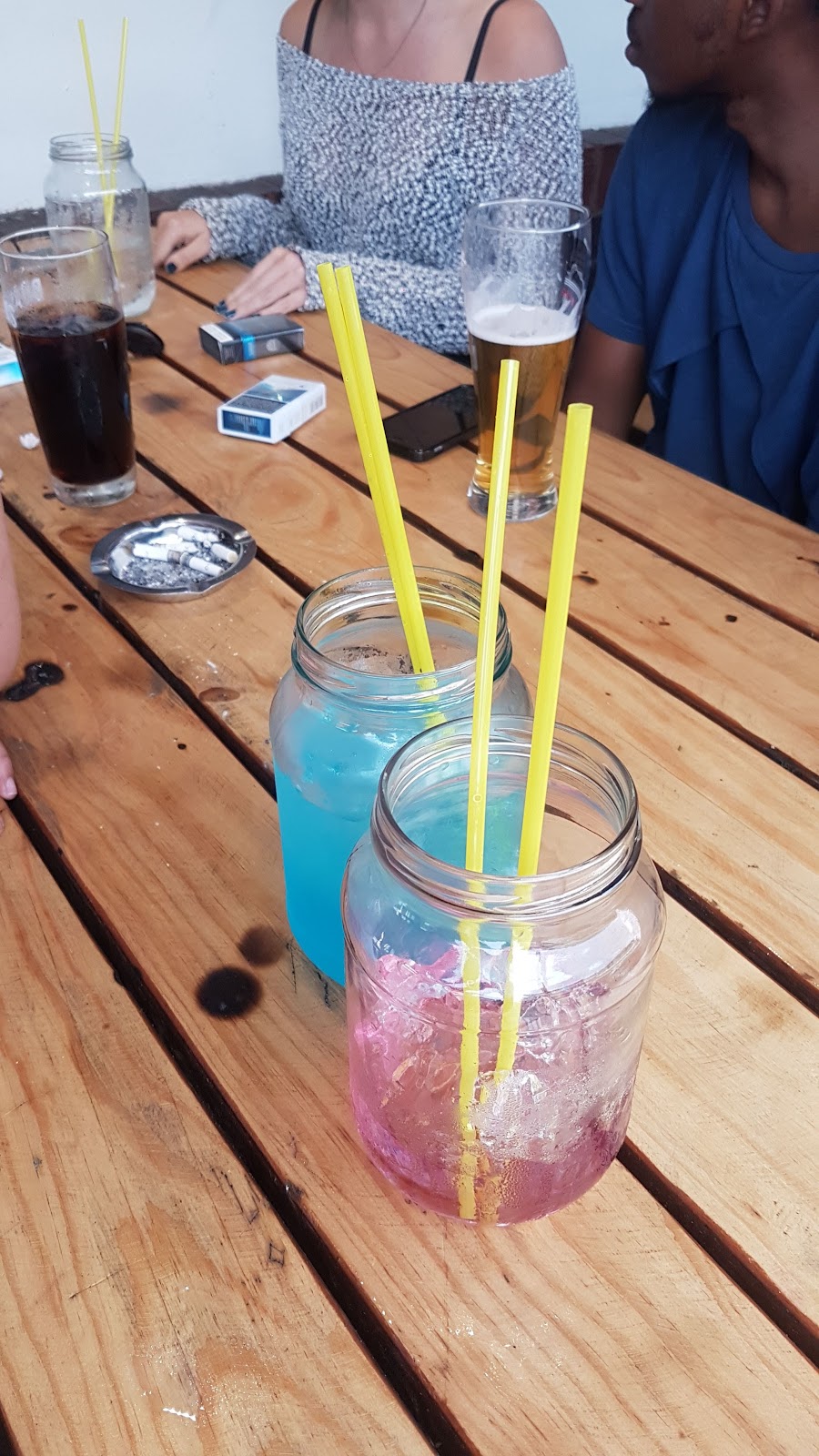 Jolly Cool bar interior with screens, Parkhurst Johannesburg