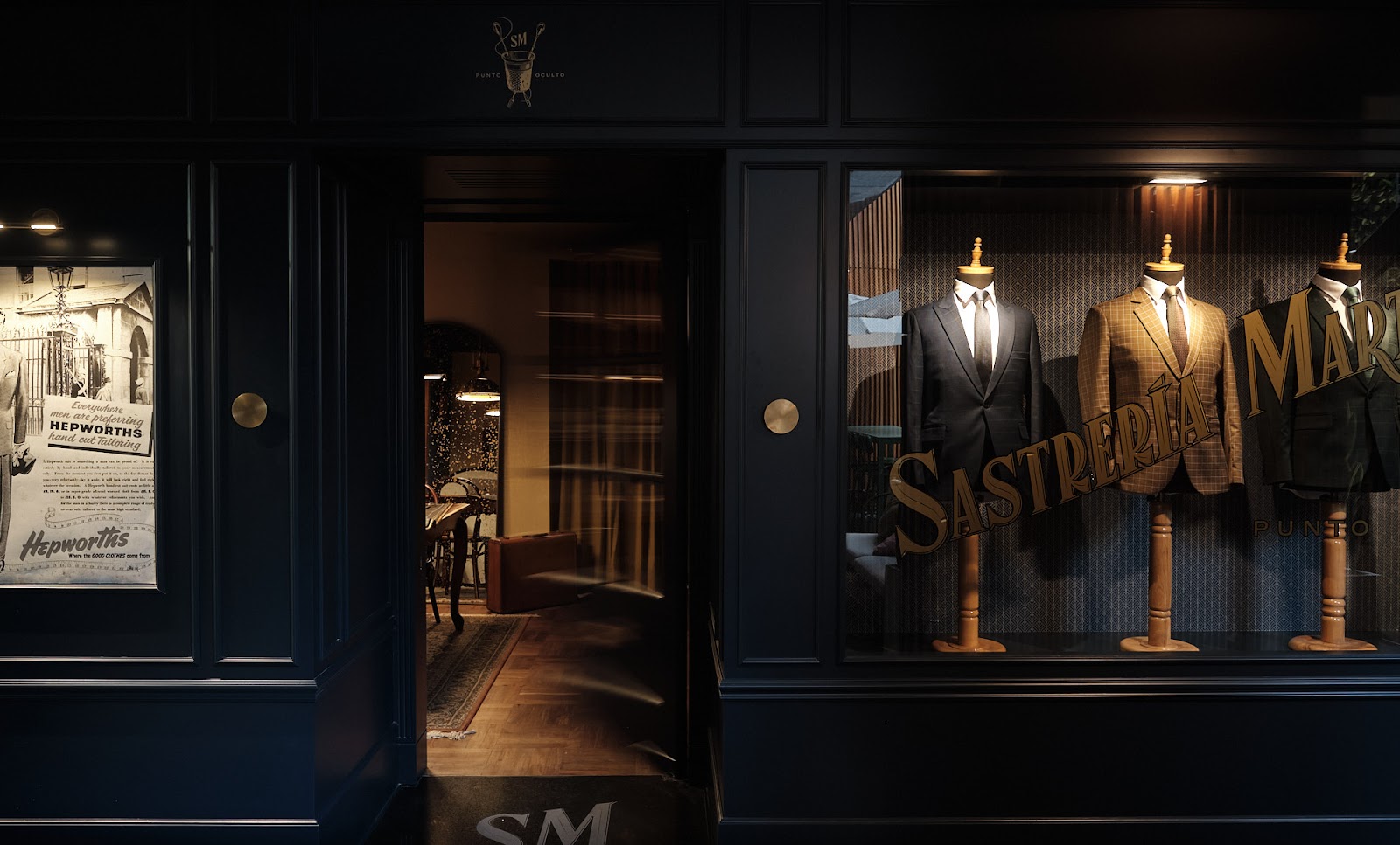 Hidden speakeasy bar with low golden light, similar in feel to Sastreria Martinez Lima