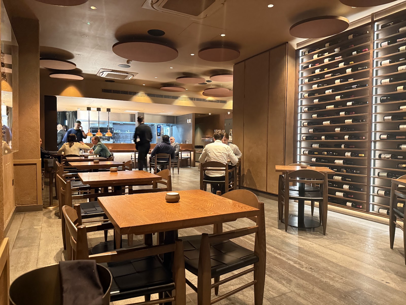 Akoko bar corner interior in Fitzrovia London with warm terracotta tones
