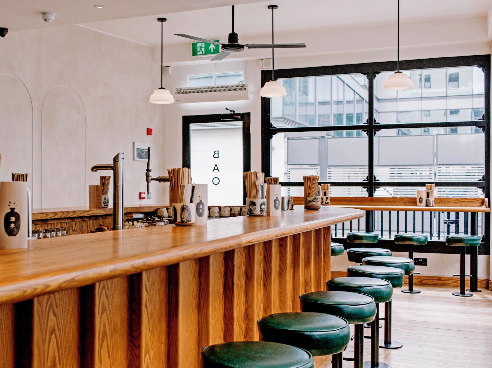 BAO Fitzrovia U-shaped wooden bar interior in London