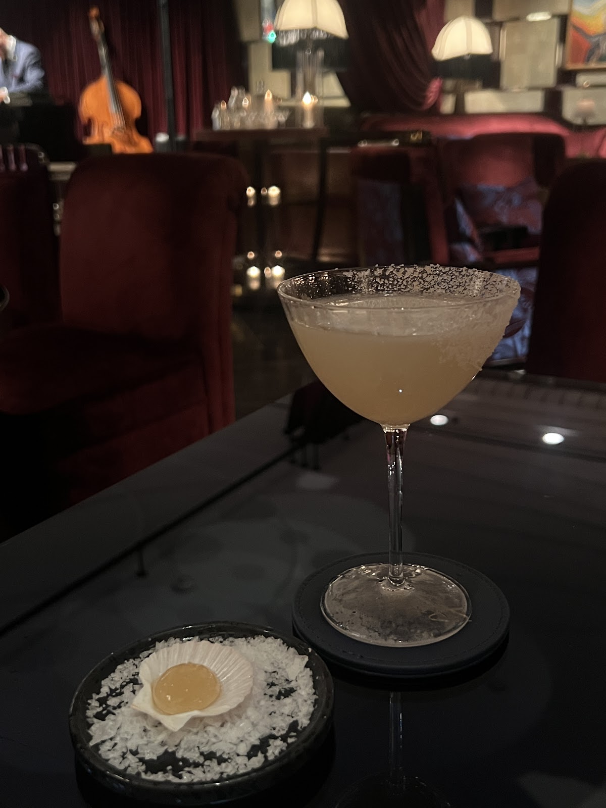 Cocktail close up on a dark bar