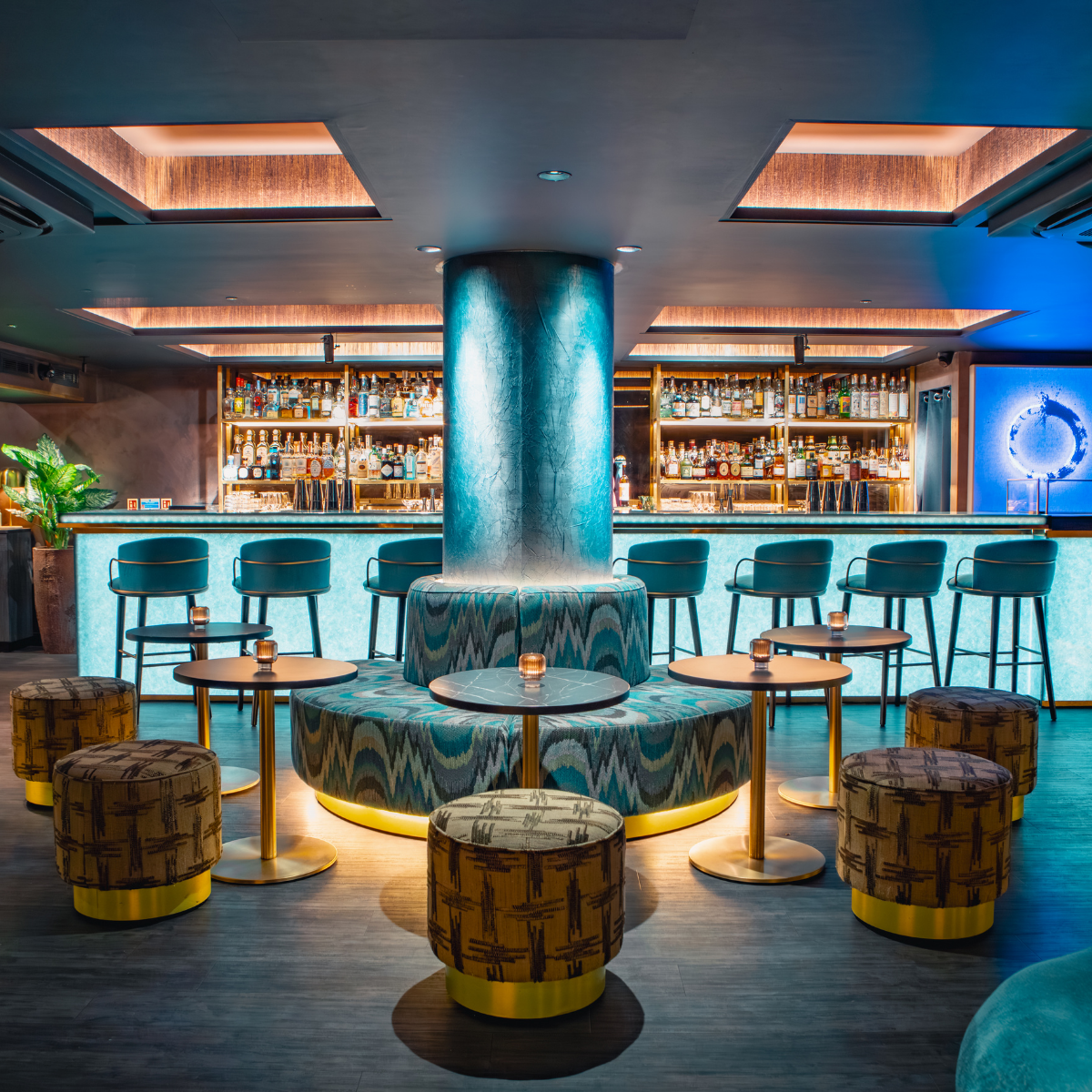 Candlelit bar with dark interior