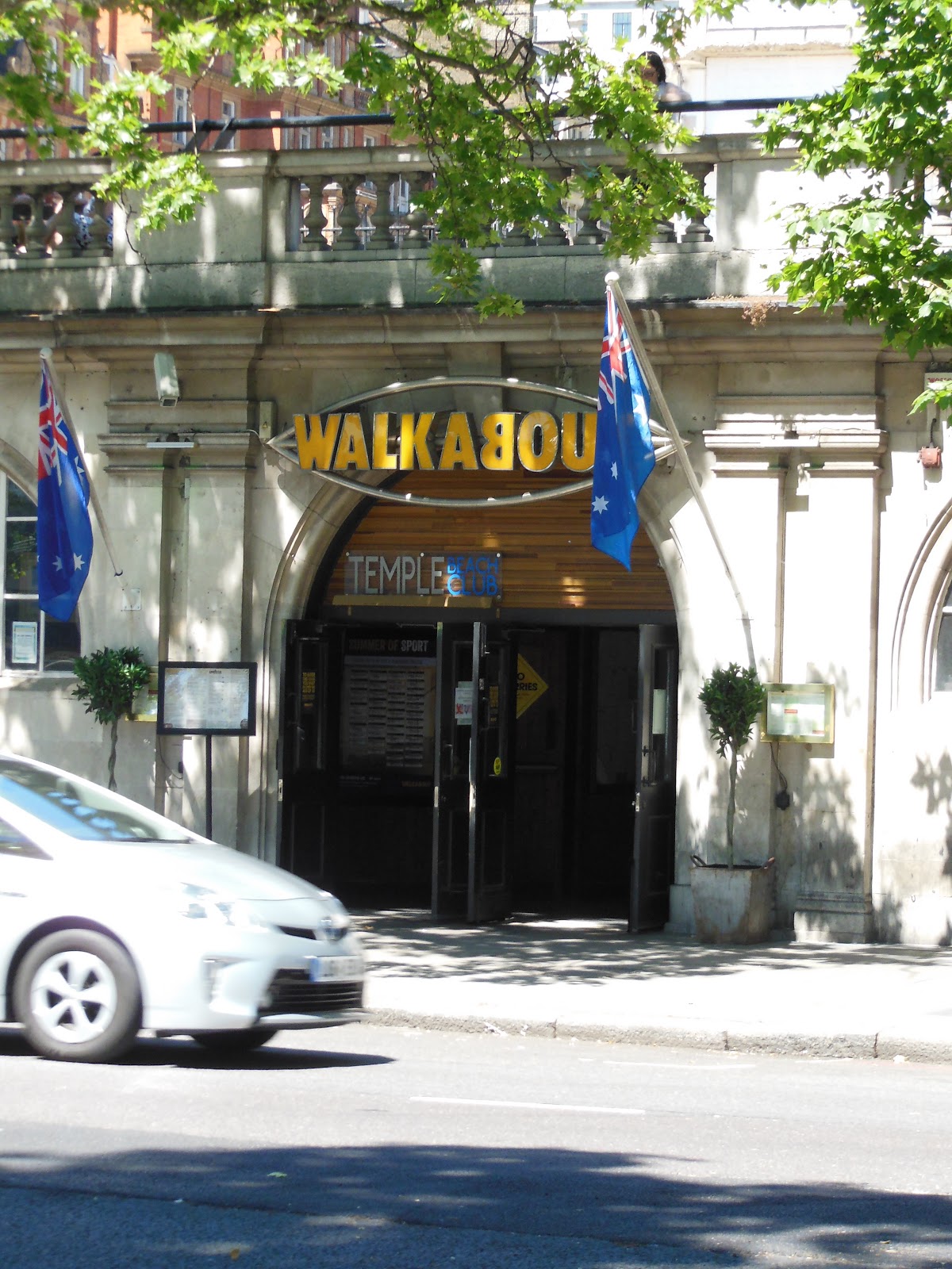 Interior of Walkabout Temple Australian sports bar with screens, central London