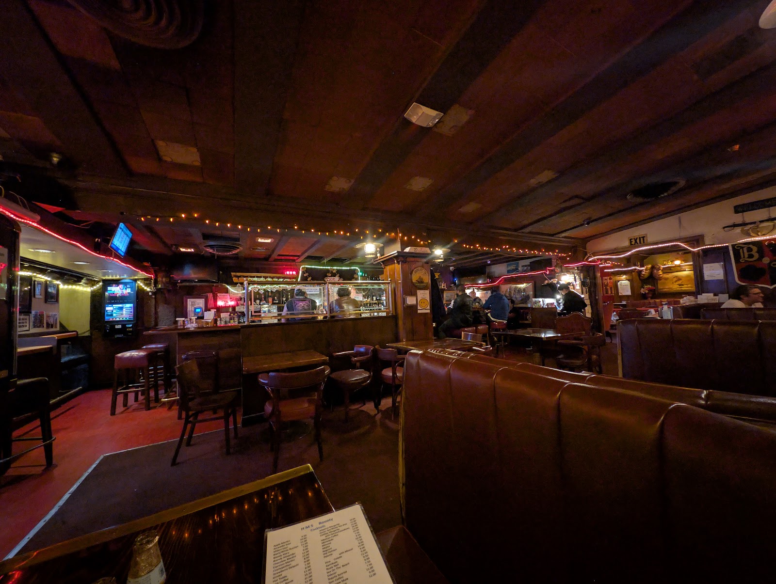 Dim bar interior with warm lamps