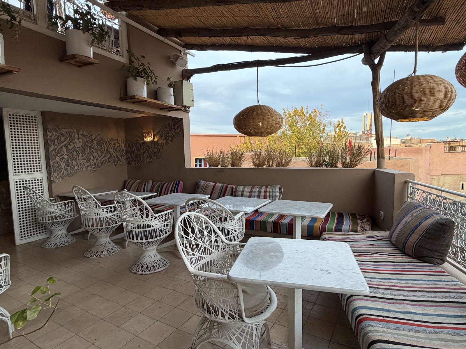 Rooftop restaurant terrace with shade sails