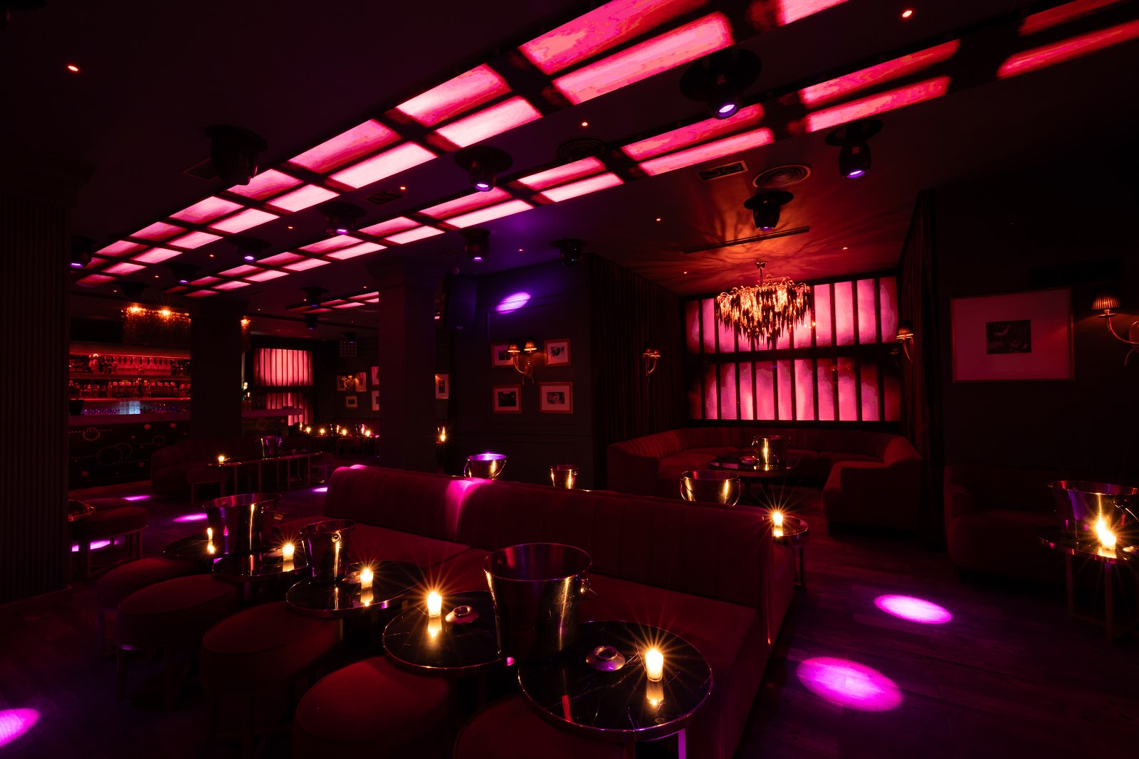 Dramatic club lighting over a dance floor