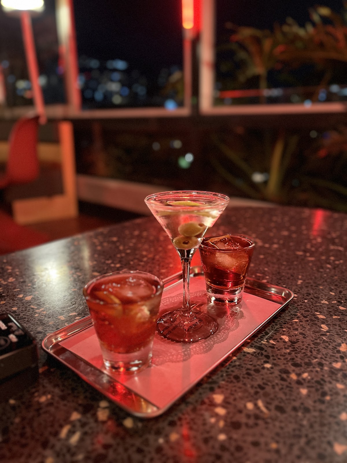 City lights from a rooftop bar
