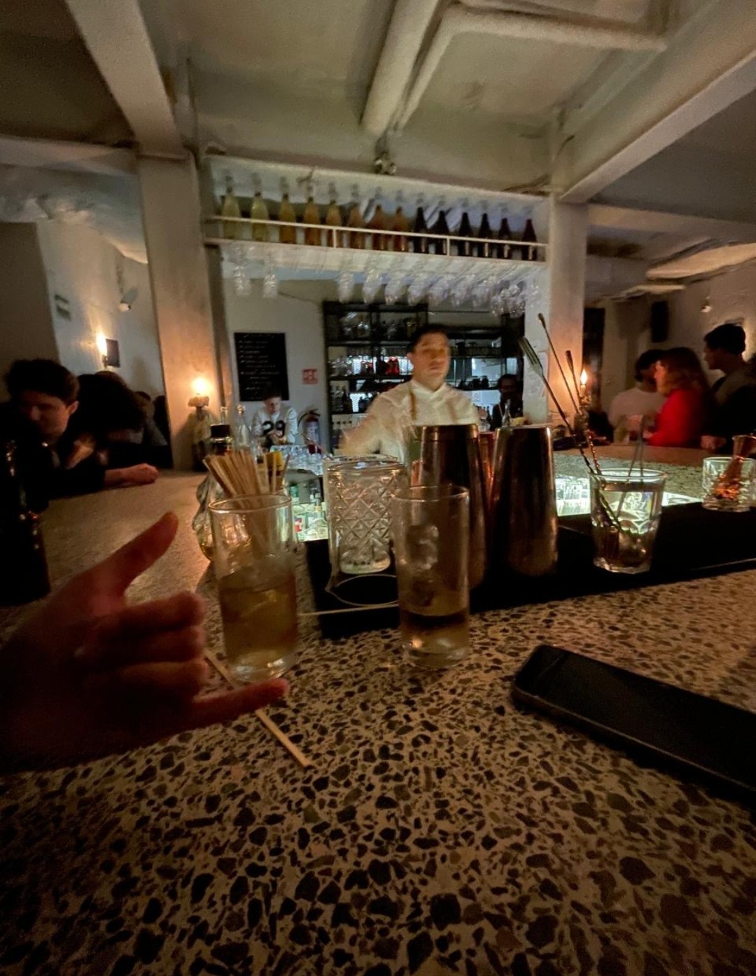 Cocktail close up on a dark bar