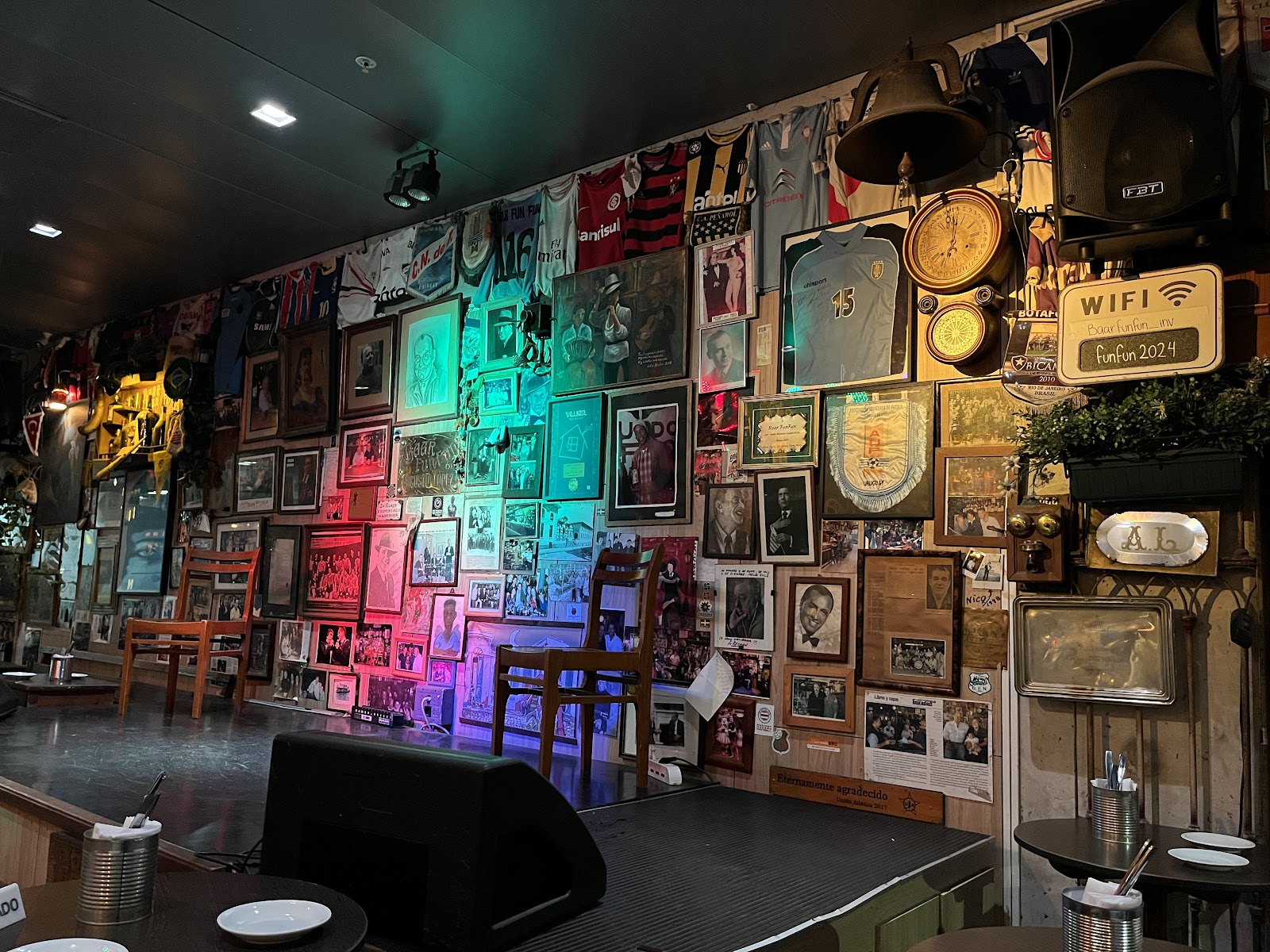 Dim stage corner of a live music bar