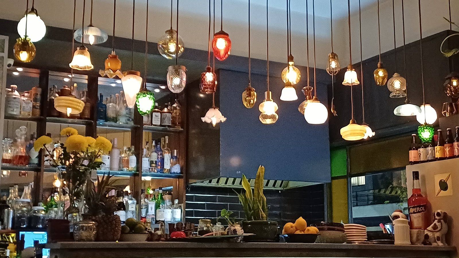 Small corner bar with stools, similar in mood to CandyBar in Montevideo