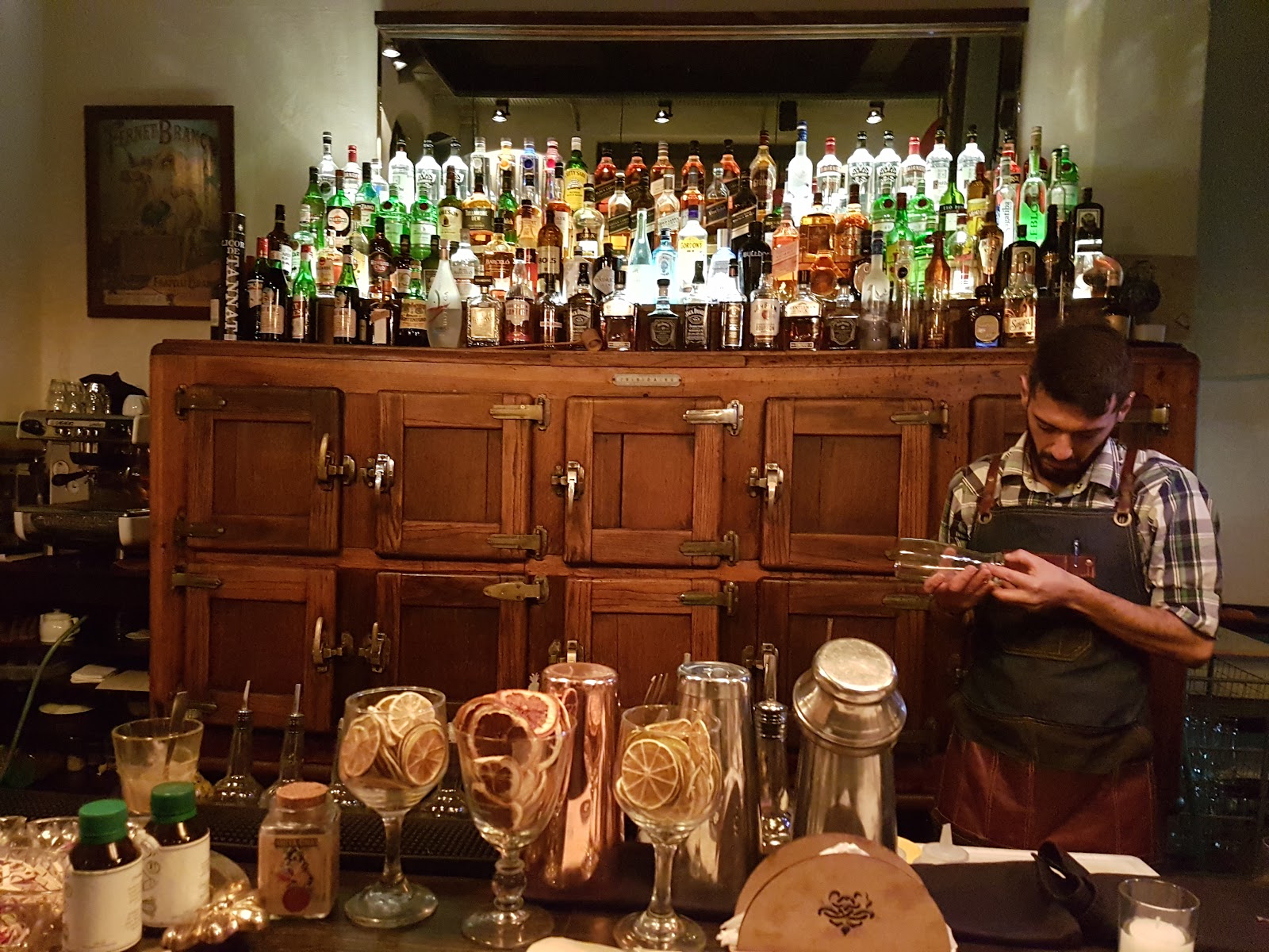 Craft beer glasses lined up on a bar
