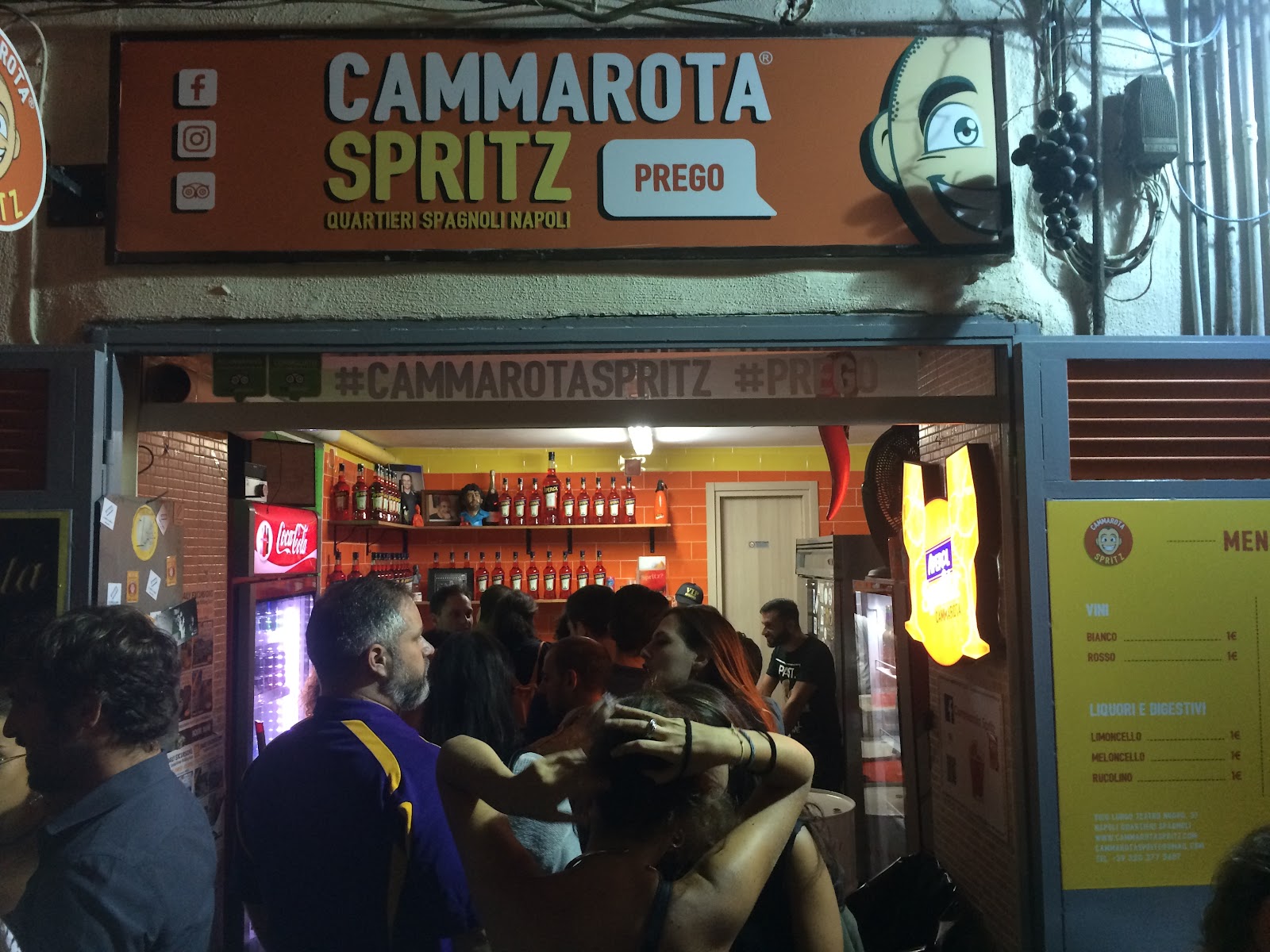 Cammarota Spritz Naples: drinks in a narrow lane at night