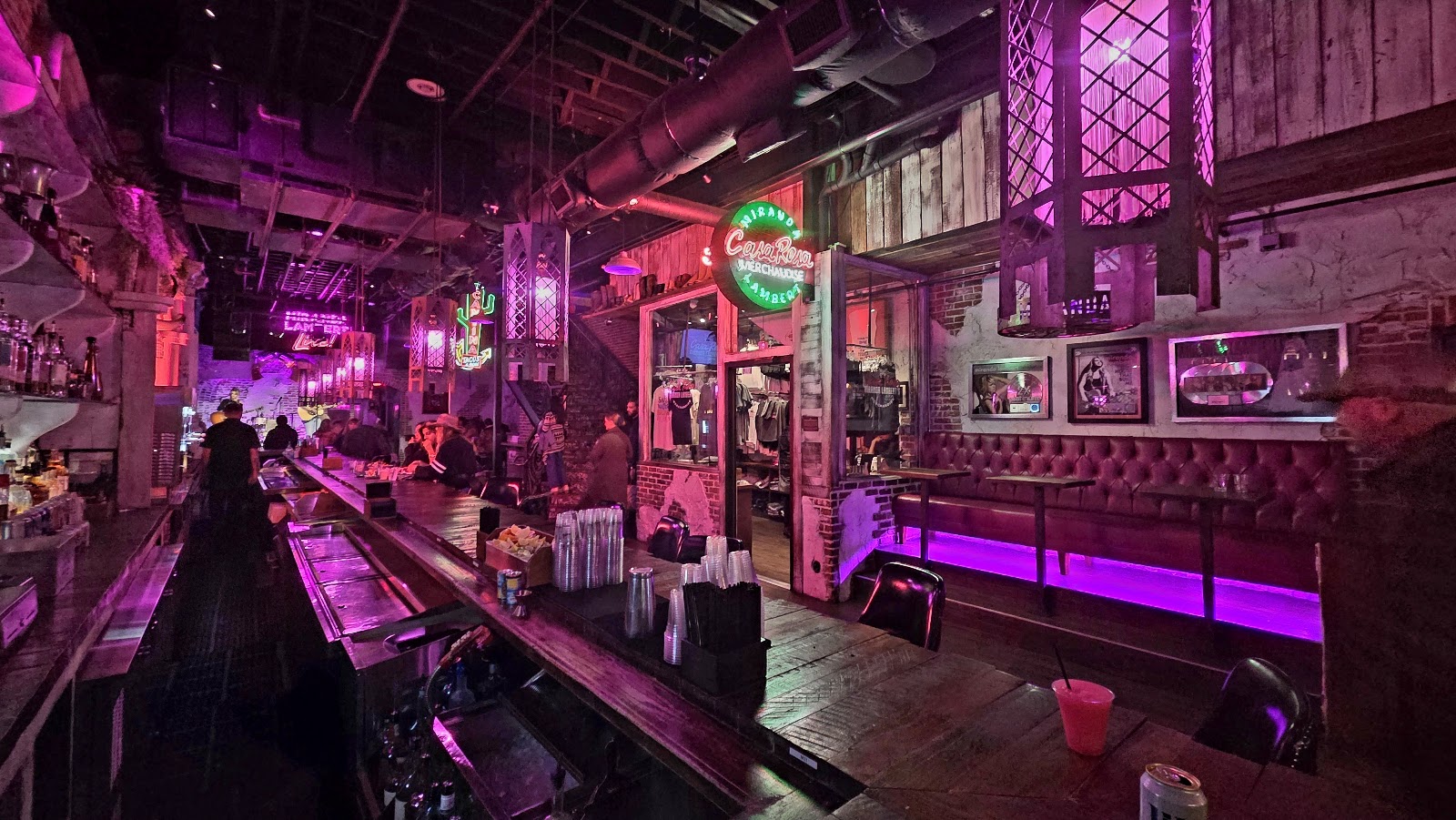 Pink lit Tex-Mex cantina bar with live music on Broadway in Nashville