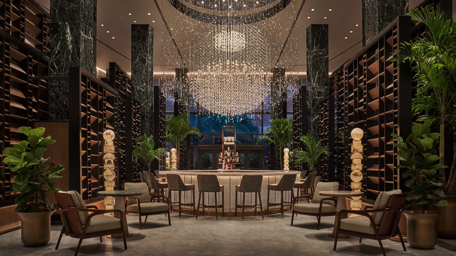 Crystal chandelier and circular bar at the Chandelier Bar, Four Seasons New Orleans