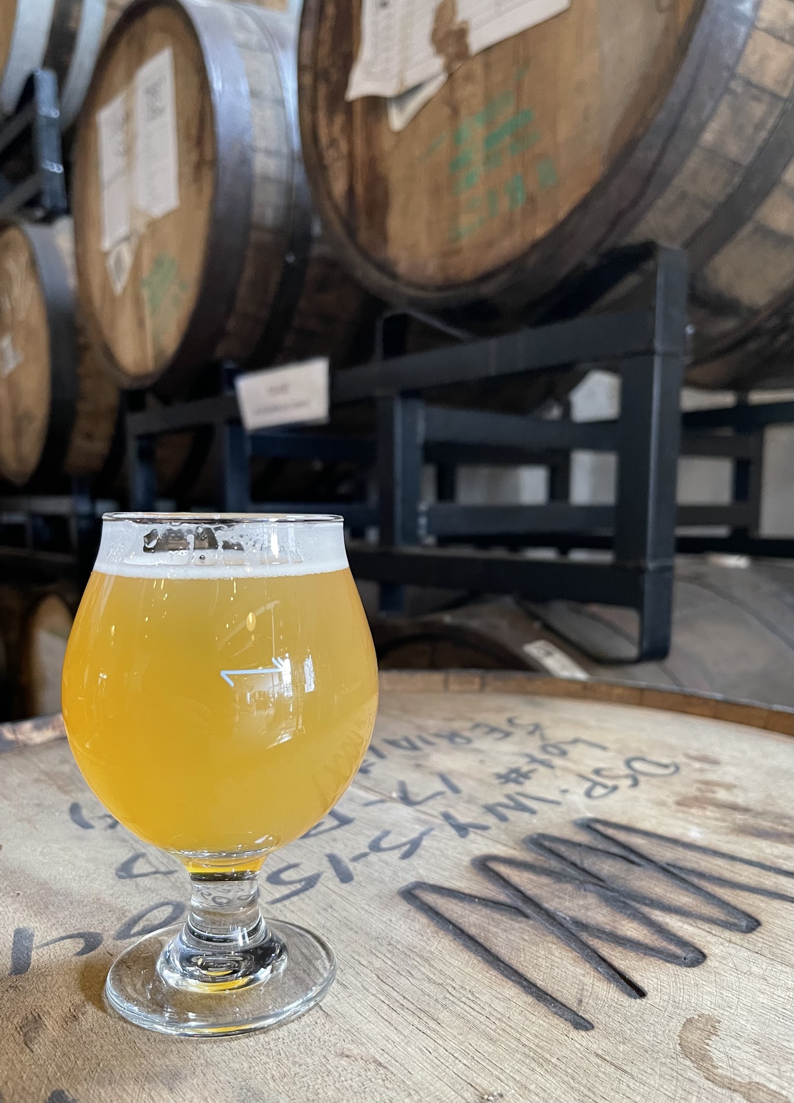 Finback Brewery taproom interior beside the brewing tanks in Glendale Queens
