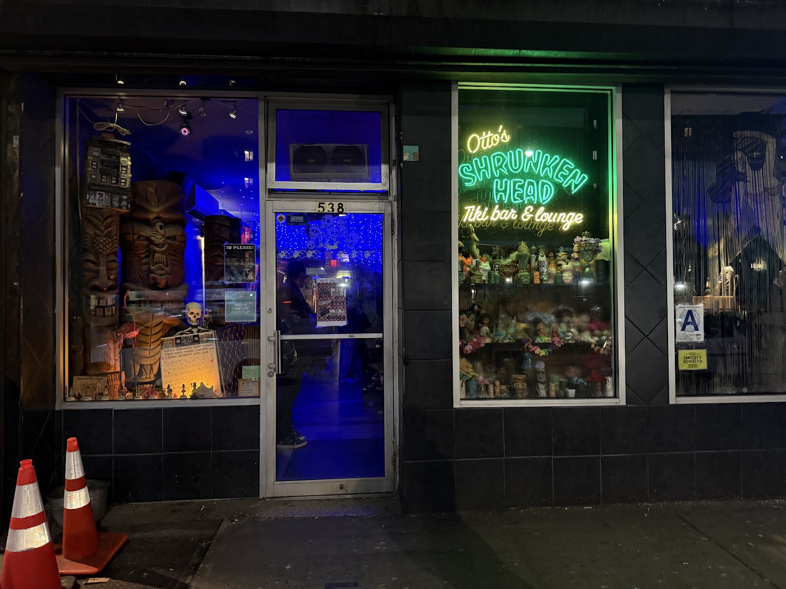Otto's Shrunken Head tiki bar interior with tiki mugs in the East Village, New York