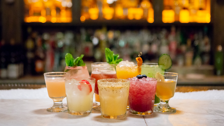 A classic cocktail on a long marble bar