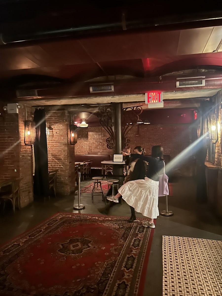 A reclaimed-wood cellar bar in Chelsea