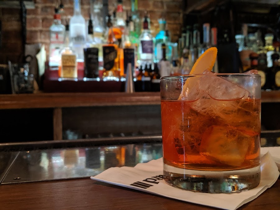Whiskey pour in a low-lit room
