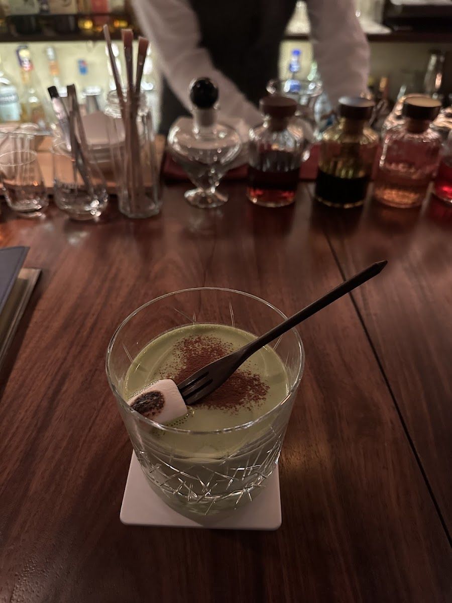 Bar Watching Pisces cocktail at the bar