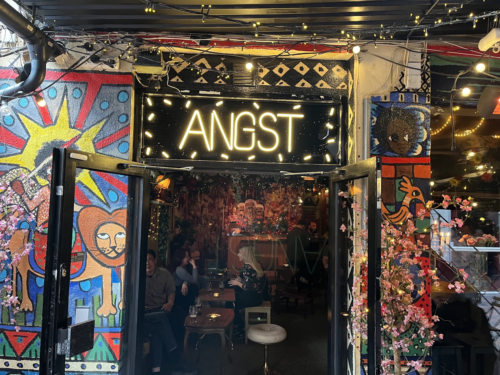 Angst cocktail bar with art-covered walls on Torggata in central Oslo
