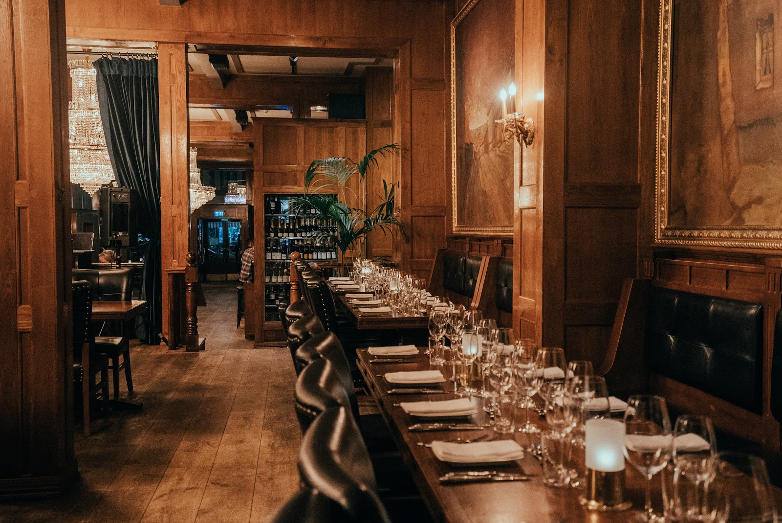 Historic Oslo beer hall with crystal chandeliers
