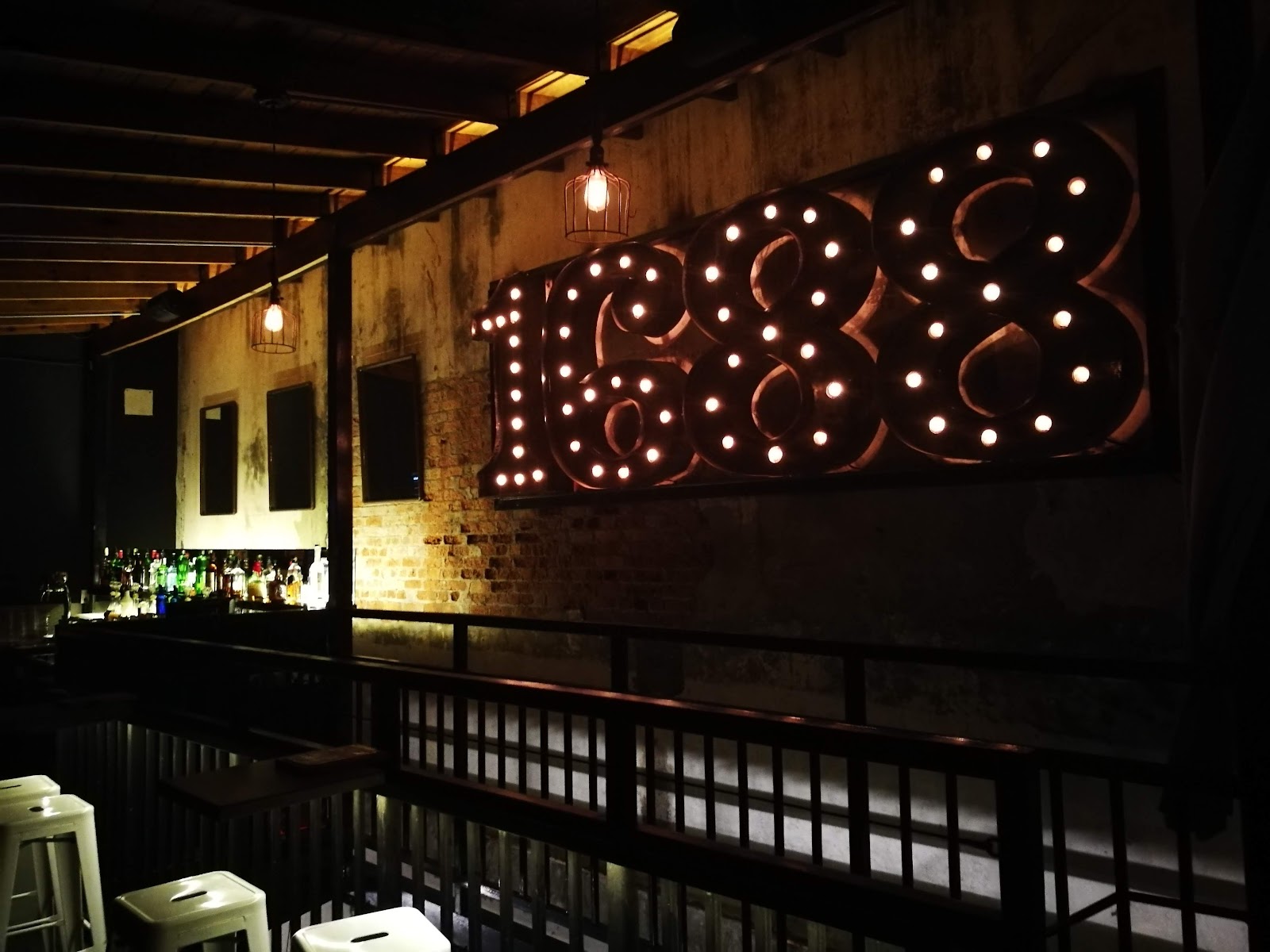 String-lit courtyard garden bar at night in Casco Viejo Panama City