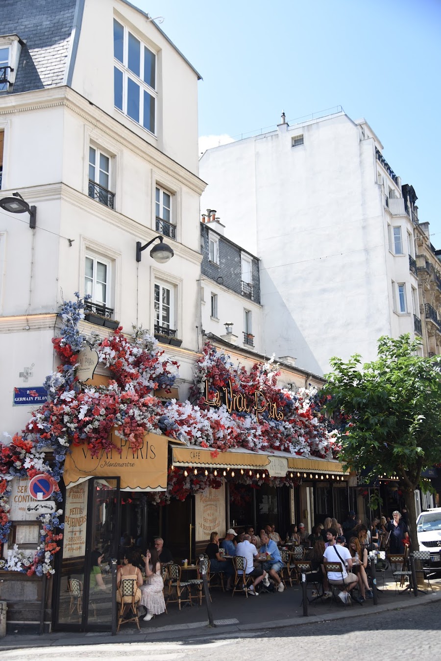 A glass of wine on a Paris cafe table