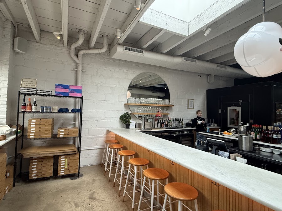 Natural wine bottles at Pizzeria Beddia