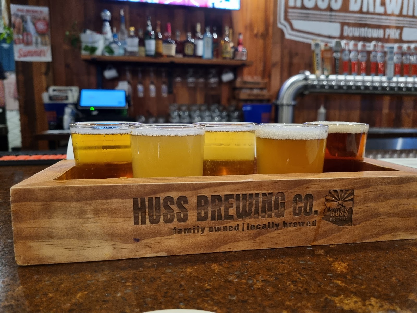 Huss Brewing taproom bar and taps in downtown Phoenix near the Convention Center