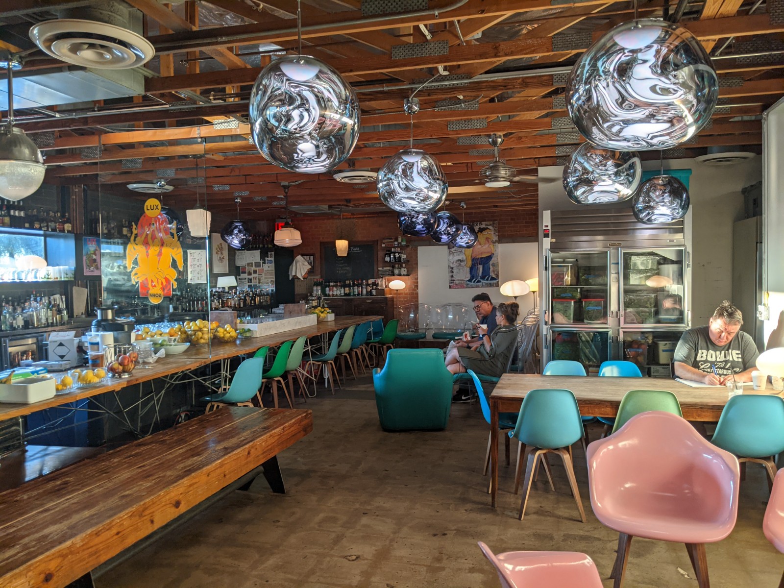 Industrial coffeehouse and cocktail bar interior at Lux Central, uptown Phoenix