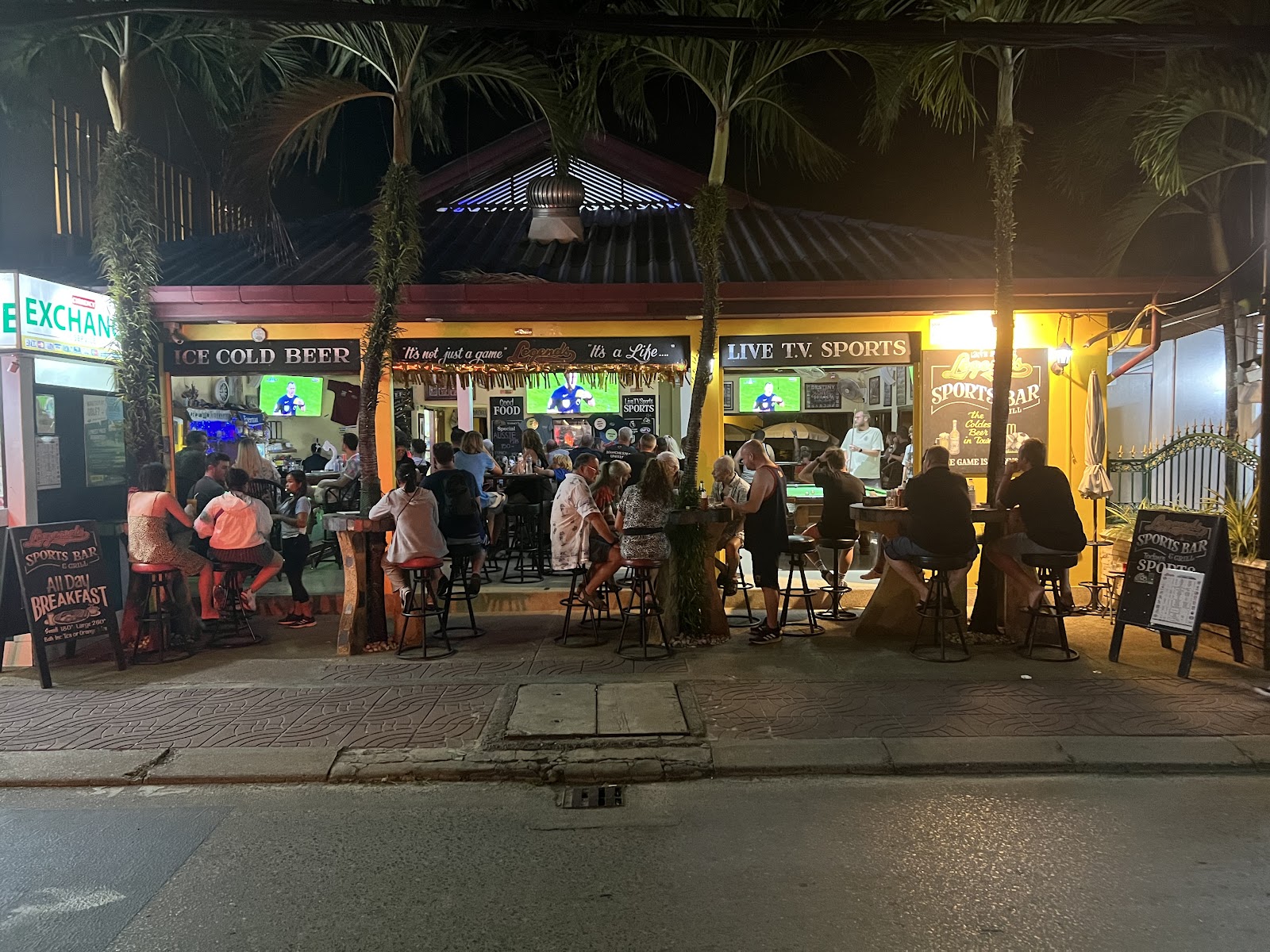 Open sided sports bar with big screens and cold beer