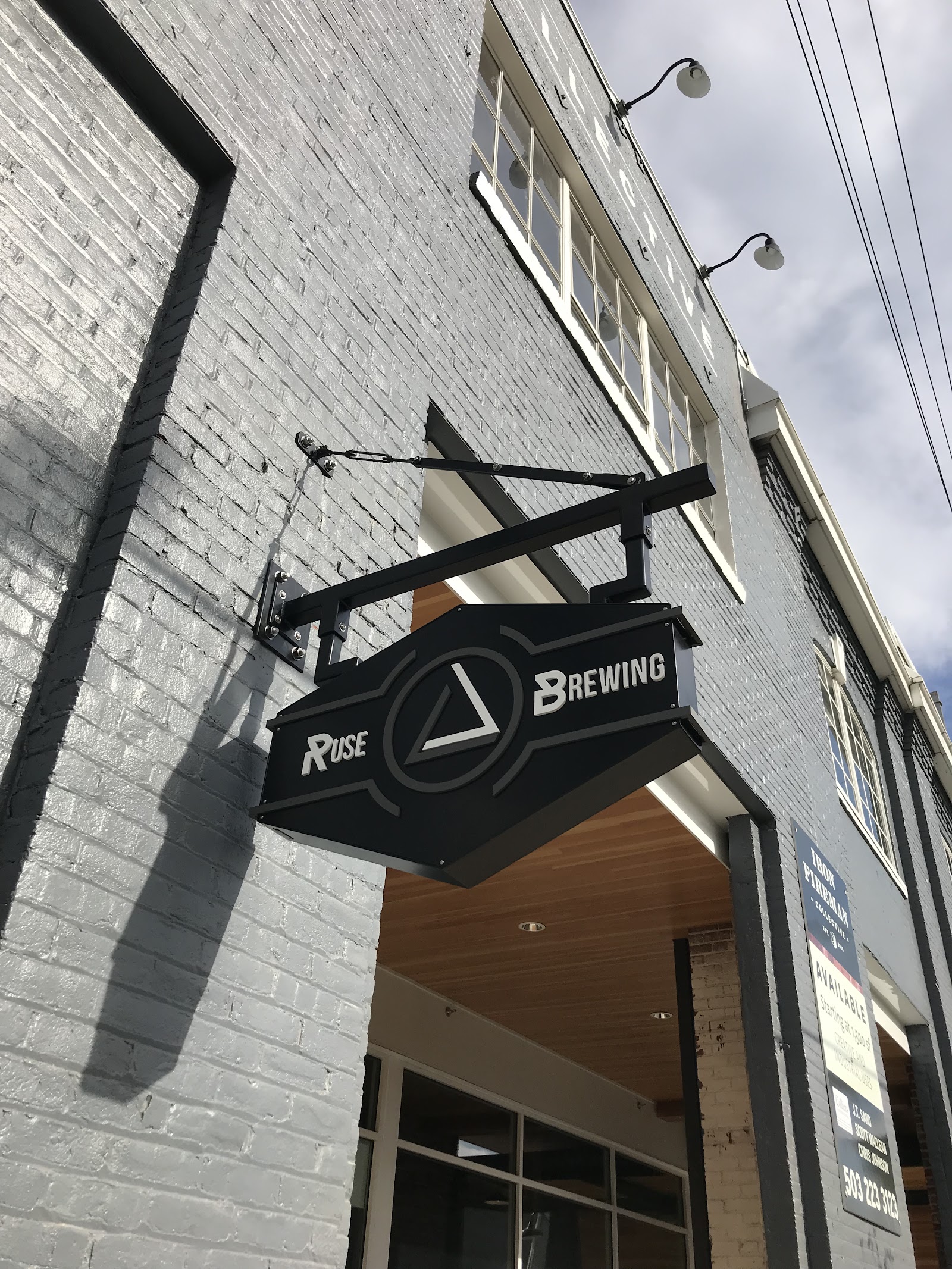 Row of taproom beer taps pouring fresh craft beer in Portland