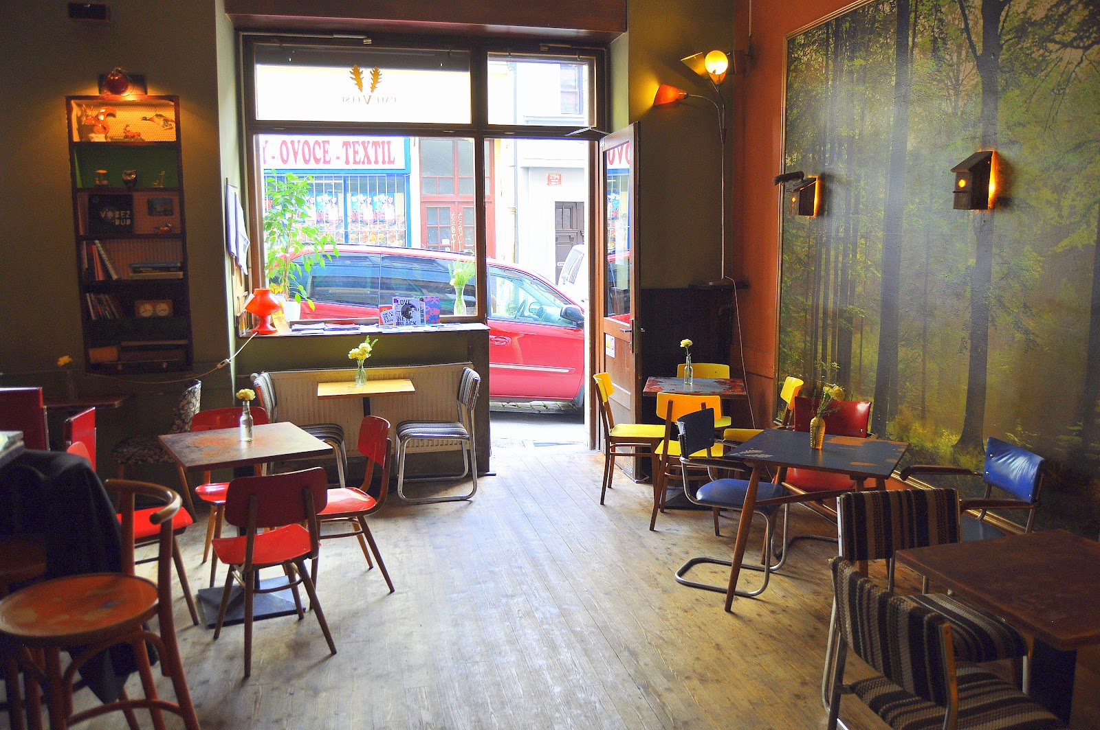 Retro-furnished bar room at Cafe V lese in Prague
