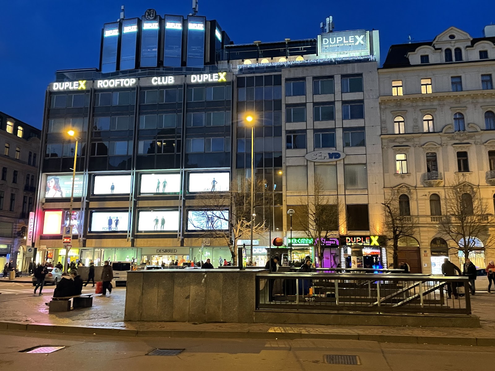 Duplex rooftop club glass cube above Wenceslas Square in Prague
