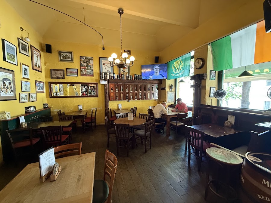 Dark-wood Irish pub interior in Old Town Prague