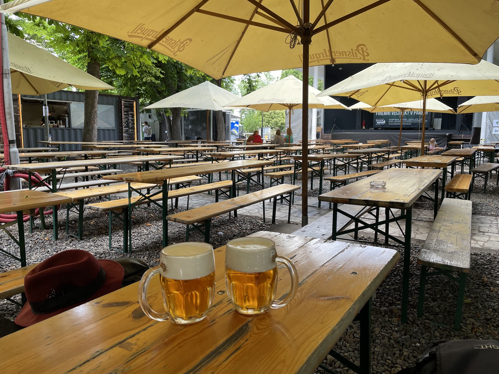 Tables under the chestnut trees at Riegrovy Sady Beer Garden in Prague