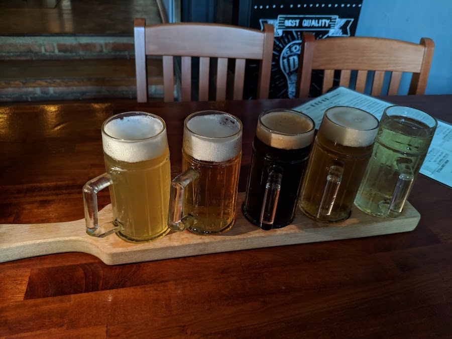 Rotating craft beer taps at Zubaty pes Prague