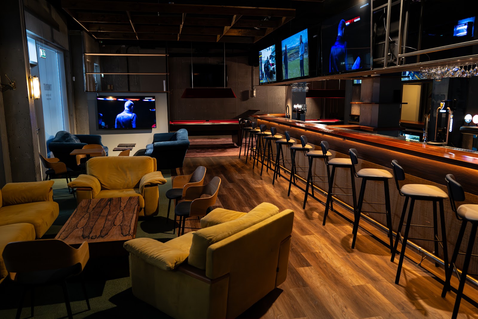 Reykjavik Sportbar interior with pool tables and sports screens